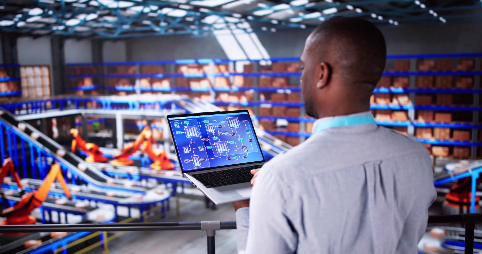 Engineer Worker Using Warehouse Automation Dashboard